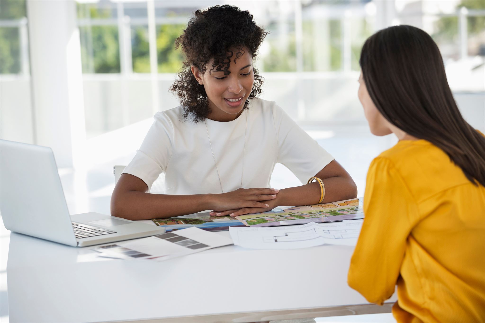 Two-women-sitting-at-table